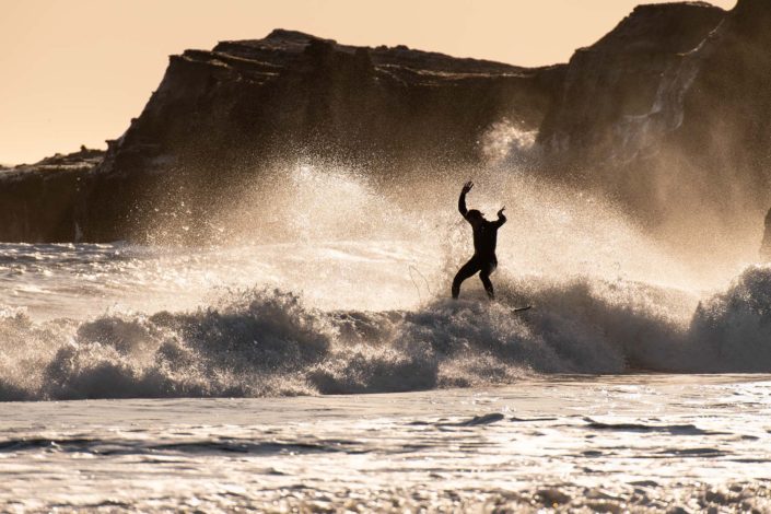 Surfer at Año Nuevo Reserve Landing Back on to Wave